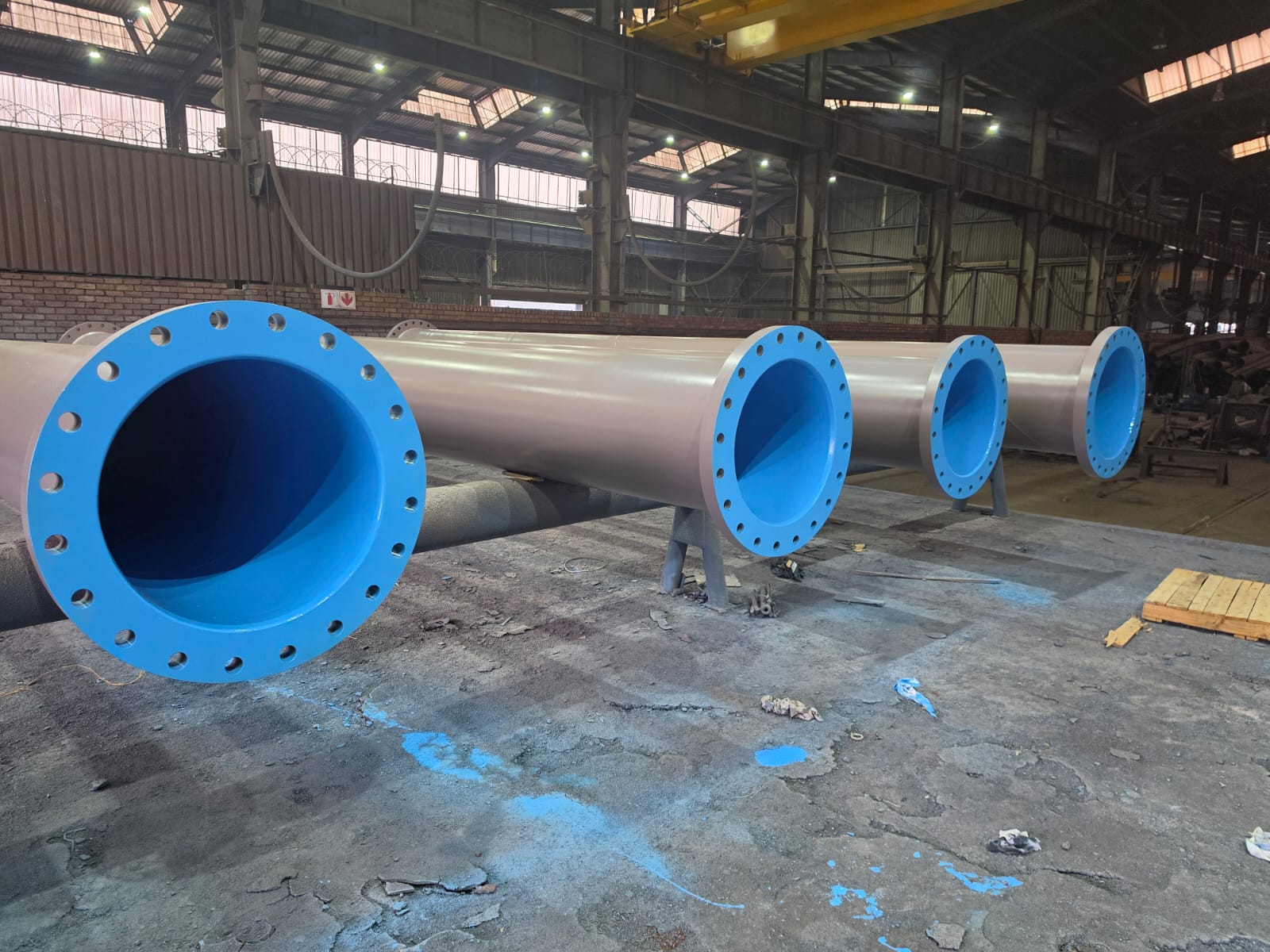 Epoxy-lined flanged steel pipe spools in the Wetpipe fabrication workshop
